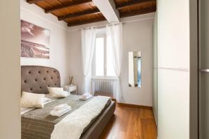 Posteľ alebo postele v izbe v ubytovaní The Hide Trastevere