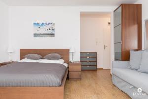 Posteľ alebo postele v izbe v ubytovaní Jantar Apartamenty- Zielone Tarasy