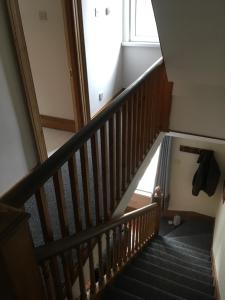 an overhead view of a stairway in a house at Erin Cottage in Derry Londonderry
