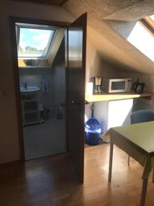 Kuchyň nebo kuchyňský kout v ubytování Ferienwohnung Zeitler