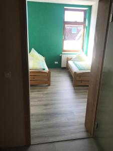 Postel nebo postele na pokoji v ubytování Ferienwohnung Zeitler