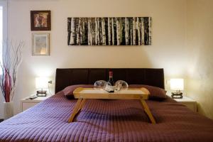 Ein Bett oder Betten in einem Zimmer der Unterkunft Enjoy Belgrade