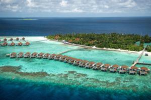 an aerial view of a resort in the ocean at ROBINSON MALDIVES - Adults only in Gaafu Alifu Atoll