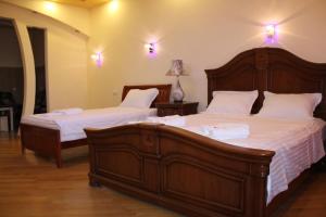 Voodi või voodid majutusasutuse Hotel For You toas