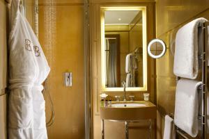 a bathroom with a sink and a mirror at Hotel Balestri - WTB Hotels in Florence