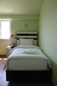 Voodi või voodid majutusasutuse Hotel For You toas