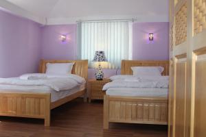 Voodi või voodid majutusasutuse Hotel For You toas