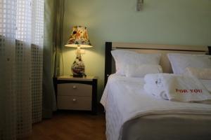 Voodi või voodid majutusasutuse Hotel For You toas
