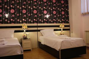 Voodi või voodid majutusasutuse Hotel For You toas