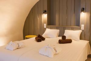Postel nebo postele na pokoji v ubytování Johan Suites & Spa + 37 fotografií