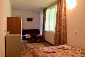 Postel nebo postele na pokoji v ubytování Complex Pele