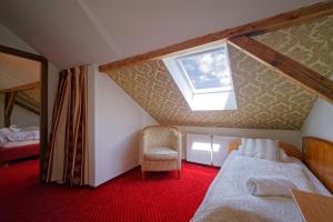 Postel nebo postele na pokoji v ubytování Penzion Janka