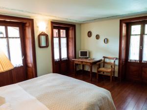 TV a/nebo společenská místnost v ubytování Albergo Montagna Di Luce
