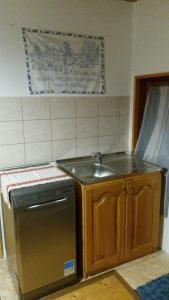 Kuchyň nebo kuchyňský kout v ubytování Chalupa Oľšavica