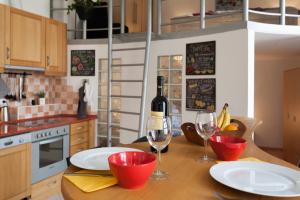 Kuchyň nebo kuchyňský kout v ubytování Feel at home Apartment