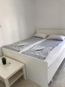 Postel nebo postele na pokoji v ubytování IN Villa Guesthouse