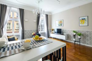 Televízia a/alebo spoločenská miestnosť v ubytovaní Markiz Luxury Apartments + 27 fotografií