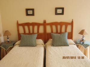 Postel nebo postele na pokoji v ubytování Hotel Toscana