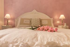 A bed or beds in a room at CASA DELL'ARTISTA