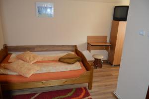 Giường trong phòng chung tại Cabana Ada 2