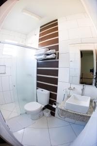 Koupelna v ubytování Hotel Tito's