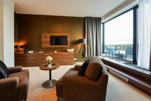 TV o dispositivi per l'intrattenimento presso Grid Hotel