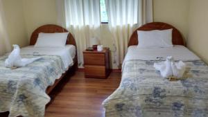 Postel nebo postele na pokoji v ubytování Ecolodge Don Felix