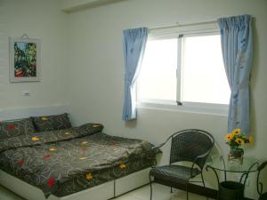 Voodi või voodid majutusasutuse Jun Le Bed and Breakfast toas
