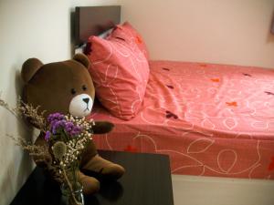 Voodi või voodid majutusasutuse Jun Le Bed and Breakfast toas