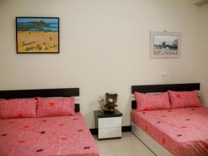 Voodi või voodid majutusasutuse Jun Le Bed and Breakfast toas