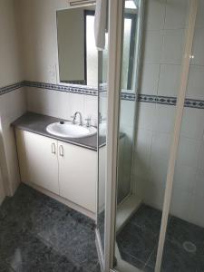 Koupelna v ubytování Hotel Cavalier