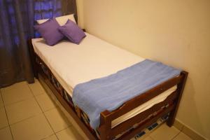 Un pat sau paturi într-o cameră la 67 First Island