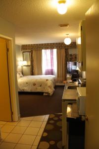 Ένα ή περισσότερα κρεβάτια σε δωμάτιο στο Hillcrest Motel
