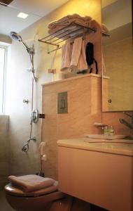 Koupelna v ubytování Hotel Ivory 32