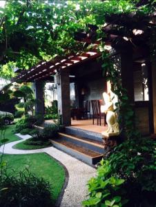 Zahrada ubytování Tanjung Sari Inn