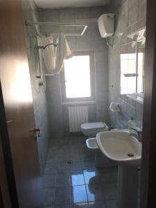 A bathroom at Umbria 22 Apartment