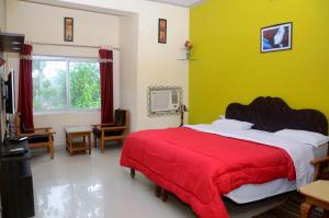 Postel nebo postele na pokoji v ubytování Hotel Prem Villas Pushkar + 20 fotografií