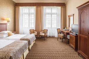Postel nebo postele na pokoji v ubytování Majestic Plaza Hotel Prague