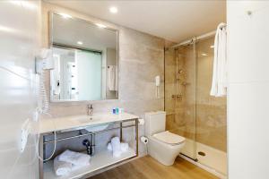 Ванная комната в Marvell Club Hotel & Apartments