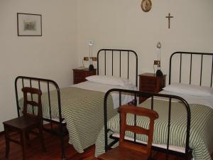 Postel nebo postele na pokoji v ubytování Santuario di Oropa