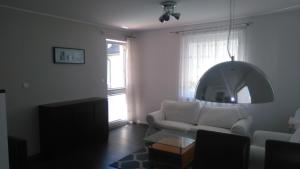 Posteľ alebo postele v izbe v ubytovaní Apartament Nadmorski Jelitkowo
