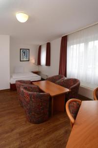 Гостиная зона в Apart Hotel Sehnde