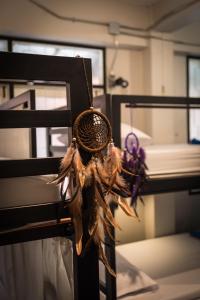 Dreamcatcher Bangkok客房内的一张或多张床位