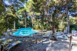 The swimming pool at or close to Lago Garden Apart-Suites & Spa Hotel
