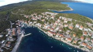 an aerial view of a small island in the water at Apartments Marijana in Zavalatica
