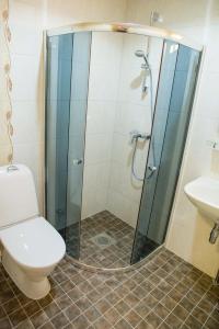 Koupelna v ubytování Ankur Hotell