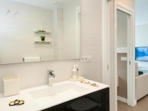 A bathroom at Beachfront Apartment Siesta 21 San Agustin Playa by VillaGranCanaria