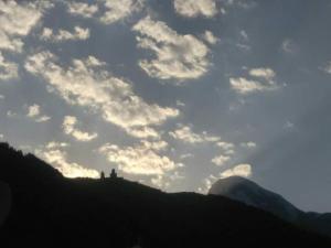 a view of a hill with a cloudy sky at Belas guesthouse in Stepantsminda