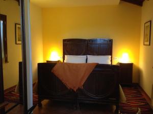 Un pat sau paturi într-o cameră la Agriturismo Olianina