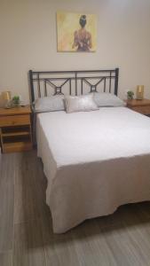A bed or beds in a room at Casa Dale